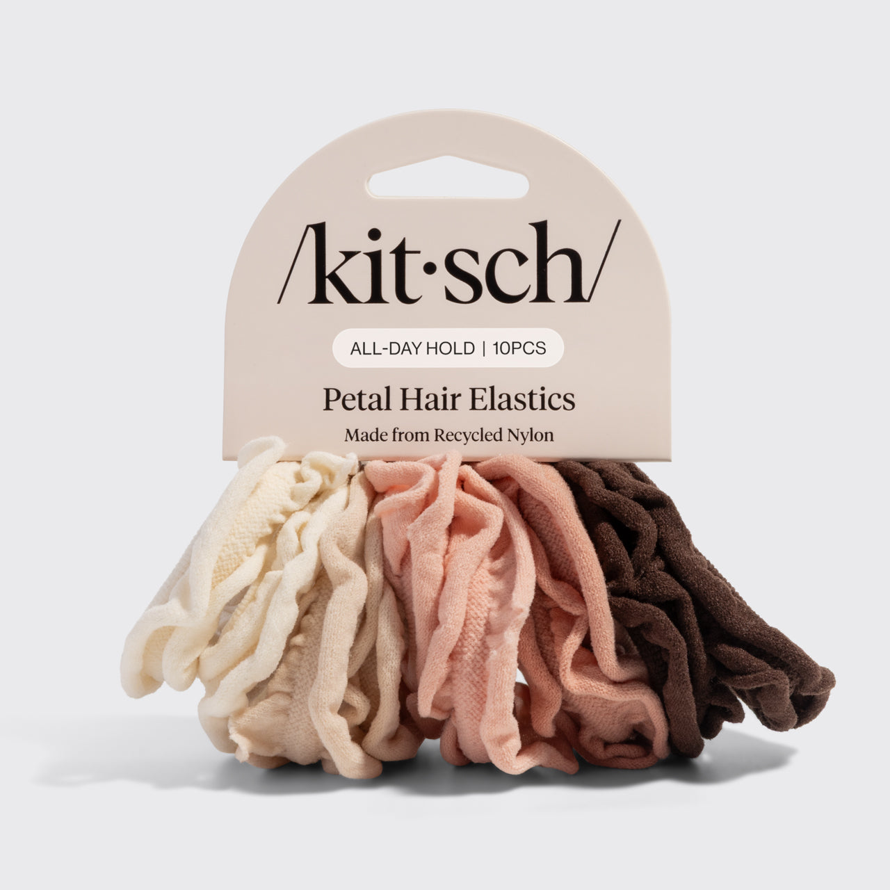 Pack of Kitsch Blush Petal Hair Elastics in cream, beige, blush, and brown on a light gray background